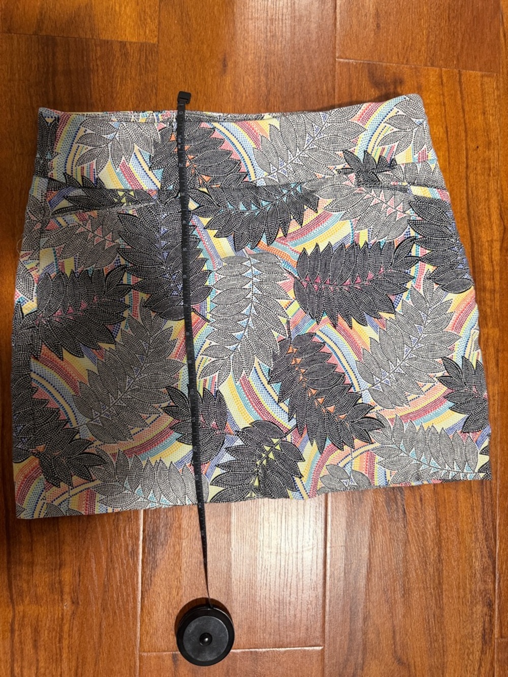 Attyre Tropical Leaf Print Mini Skort in Black and Pastels